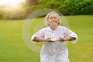 Woman with eyes closed doing breathing exercises