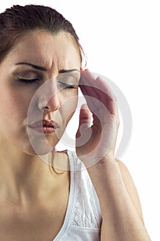 Woman with eyes closed and suffering from headache
