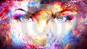Woman eyes in cosmic background. Eye contact.