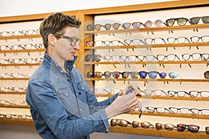 Woman in a eyewear store