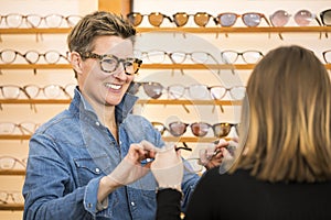 Woman in a eyewear store