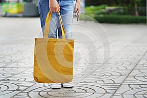 woman with fabric bag for shopping at Department Store