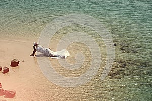 Woman face beauty. Bride on sunny day on seascape