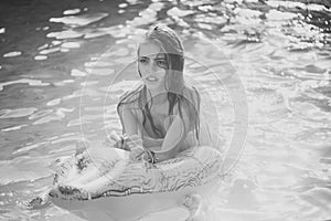 Woman face beauty. Relax in luxury swimming pool. Summer vacation and travel to ocean, maldives. Fashion crocodile