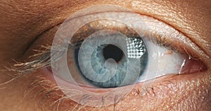 Woman face, blue color eyes and focus, vision and contact lenses to see, eyesight and awareness. Zoom macro on face