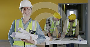 Woman, face and engineering at construction site, planning building and teamwork or project management. Happy portrait