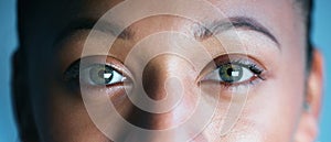 Woman, face and eyes looking for biometrics, optics or vision in the future for scanning identity. Closeup of female eye