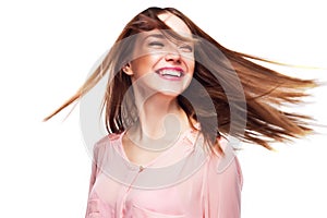 Woman face with hair motion on white background
