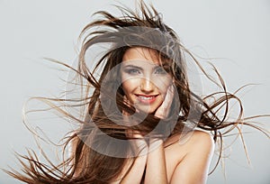 Woman face with hair motion on white background isolated