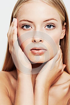 Woman, face and hands on skin for beauty, natural cosmetics and glamour on white background. Clean, skincare and