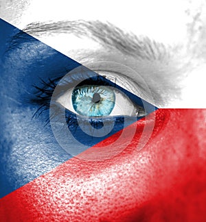 Woman face painted with flag of Czech Republic