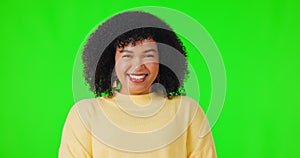 Woman, face portrait and laughing on a green screen with motivation and funny humour. Happy african female person laugh