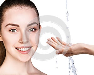 Woman face and pouring water in hand.
