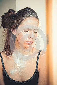 Woman face with silver body makeup.Woman with makeup and bodyart. Cosmetics for visage and skincare, hairdresser. Beauty