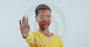 Woman, face and stop with hands, warning and caution of rejection sign in studio on white background. Portrait, african