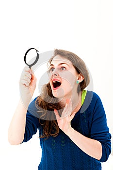 Woman face think an look up and with magnifying glass