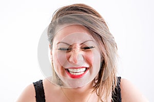 Woman Face in Toothy Laugh with Eyes Closed