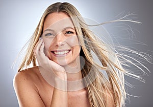 Woman, face or windy hair on studio background in keratin treatment marketing, healthcare wellness or self love routine
