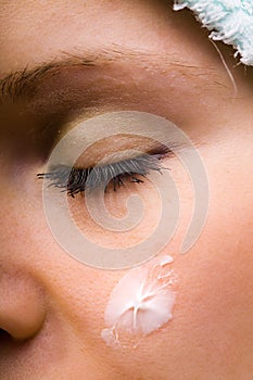 Woman and facial cream