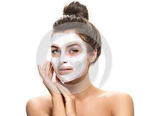 Woman with facial mask on white background