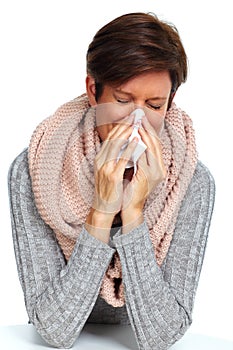 Woman with facial tissue having flu.