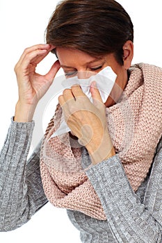 Woman with facial tissue having flu.