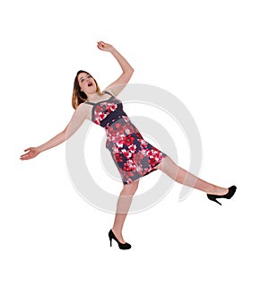 Woman falling backwards in a colorful dress