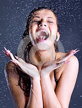 Woman with falling water droplets
