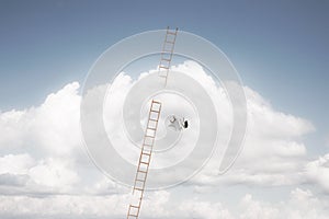 Woman falls from a ladder leading to heaven