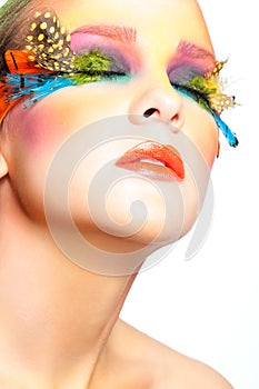 Woman with false feather eyelashes makeup