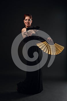 Woman with a Fan dancing flamenco