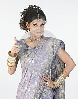 Woman with fancy sari saying challenge