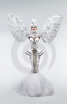 Woman in fantasy costume with feather sleeves