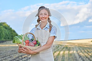 Woman farmer apron standing farmland smiling Female agronomist specialist farming agribusiness Happy positive caucasian worker