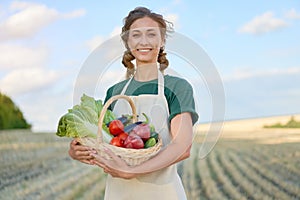 Woman farmer apron standing farmland smiling Female agronomist specialist farming agribusiness Happy positive caucasian worker