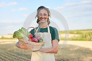 Woman farmer apron standing farmland smiling Female agronomist specialist farming agribusiness Happy positive caucasian worker