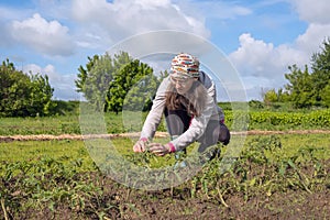 Woman farmer enthusiastically working