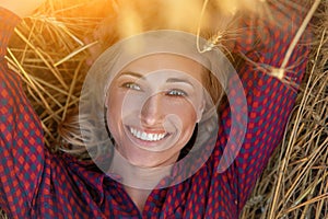Woman farmer lie farmland smiling Female agronomist specialist farming agribusiness Happy positive caucasian worker agricultural