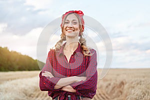 Woman farmer standing farmland smiling Female agronomist specialist farming agribusiness Happy positive caucasian worker