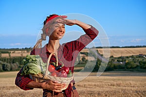 Woman farmer standing farmland smiling Female agronomist specialist farming agribusiness Happy positive caucasian worker