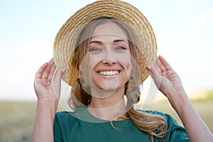 Woman farmer straw hat standing farmland smiling Female agronomist specialist farming agribusiness Happy positive caucasian worker