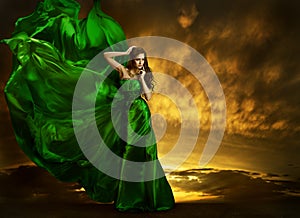 Woman Fashion Dress Fluttering Wind, Green Silk Gown Fabric photo