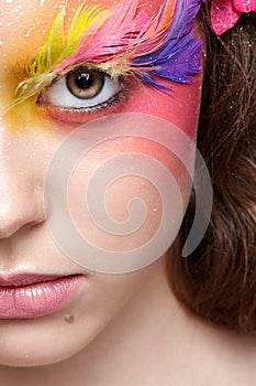 Woman with fashion feather eyelashes make-up