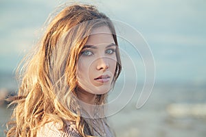 Woman Fashion Model with Makeup and Long Curly Hair