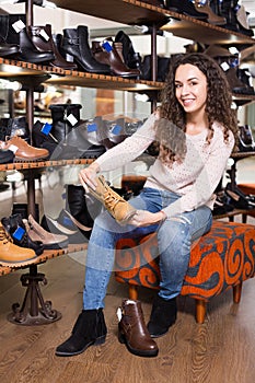 Woman at fashion shoe store