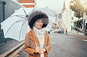 Woman, fashion and umbrella portrait in winter city while travelling and sightseeing. Tourist, style and happy young