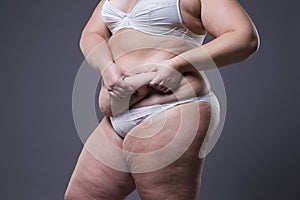 Woman with fat abdomen, overweight female stomach