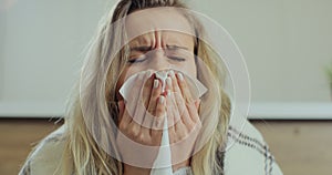 Woman feel sick blow running nose suffer from cold or influenza. Young female distressed with health problems, struggle