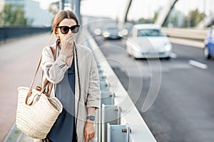 Woman feeling bad because fo the air polution outdoors