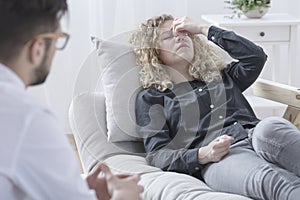 Woman feeling dizzy photo